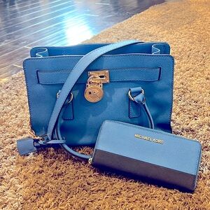 Michael Kors shoulder bad, matching wallet in cobalt blue with gold fastening.